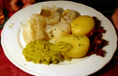 Lutfisk (on the left) with various accompaniments